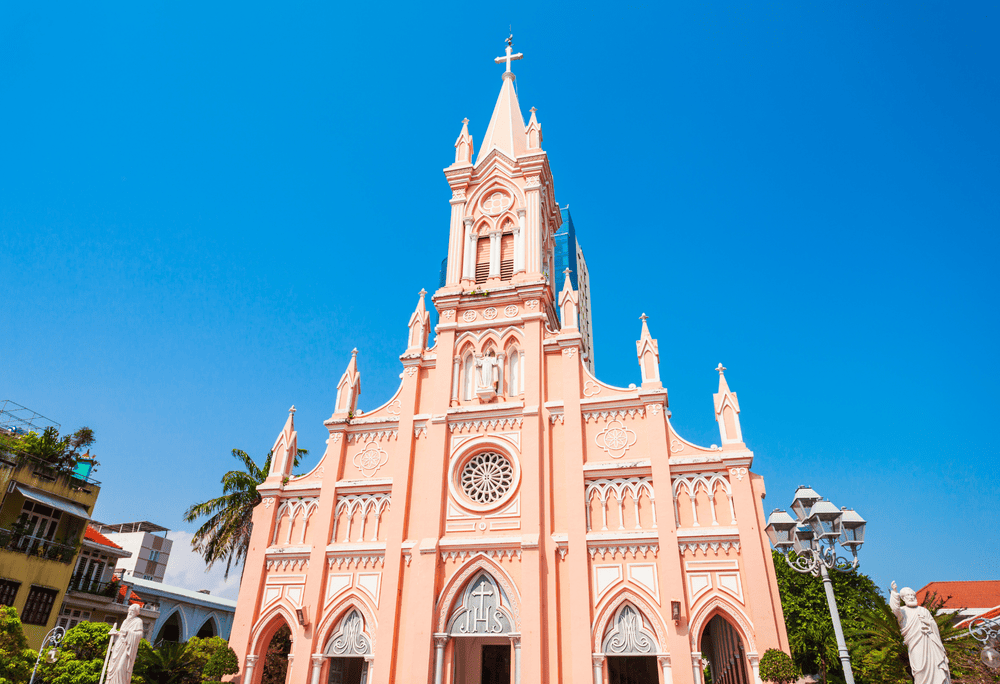 The Rooster Church’s Gothic architecture and signature pink hue make it a must-see for those who admire historical charm (Source: Canva)
